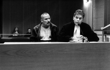 Go No Go, Les Frontières de l'Europe 1998-2002. Turkish immigrant with his lawyer at a court hearing concerning his residence permit. Amsterdam, Netherlands, 2001. Ad Van Denderen / Agence Vu'
