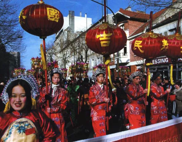 Patrick Zachmann. Chinese New Year parade, avenue d'Ivry, 13th arrondissement. 1998