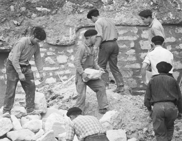 France 1963. Portuguese immigrant workers on a building site
