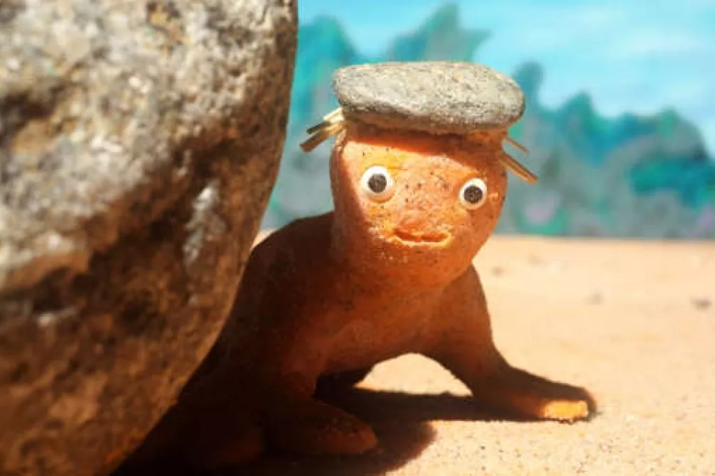 au bord de l'eau bonhomme de sable